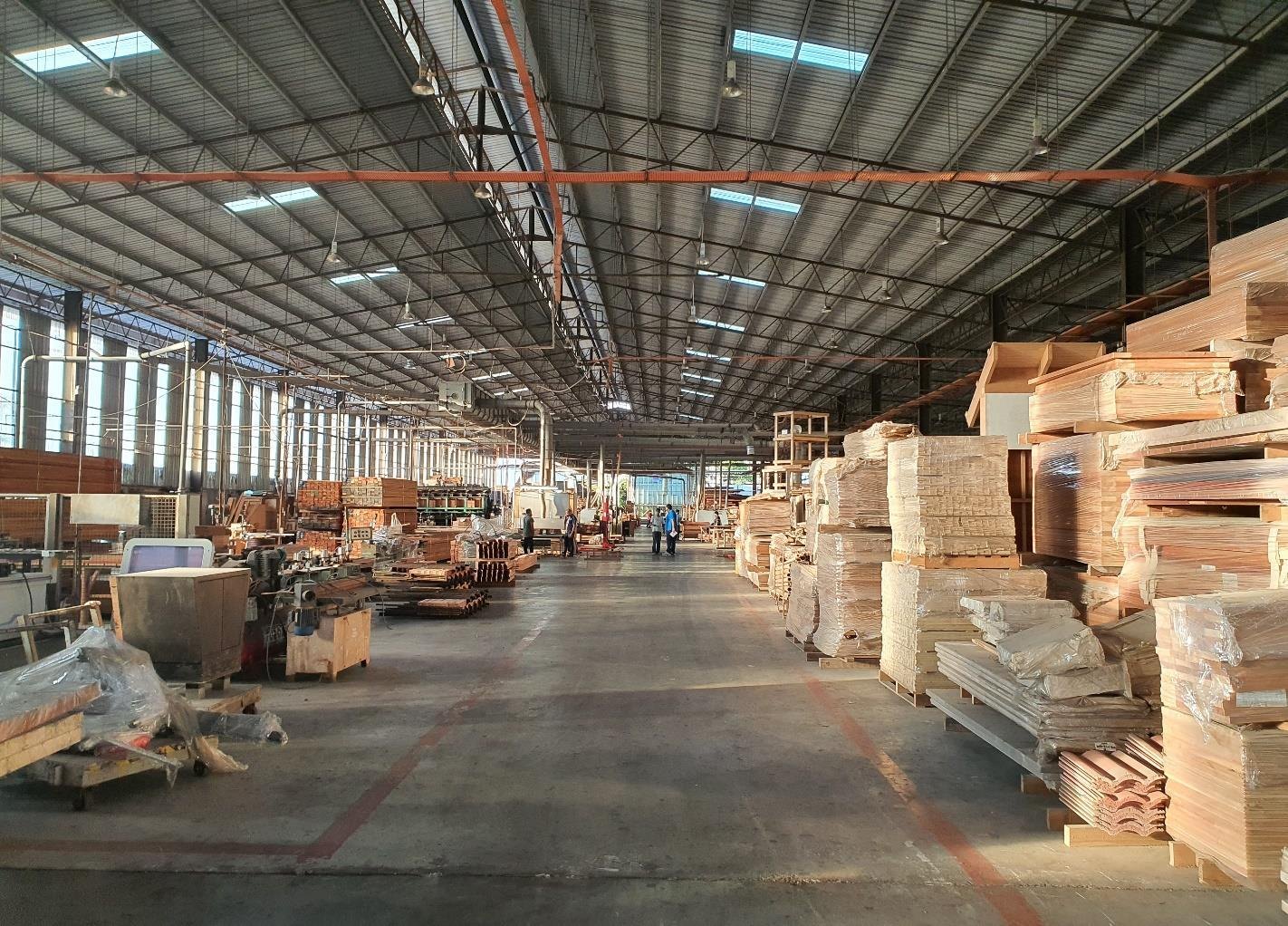 Timber stock and materials inside a manufacturing workshop